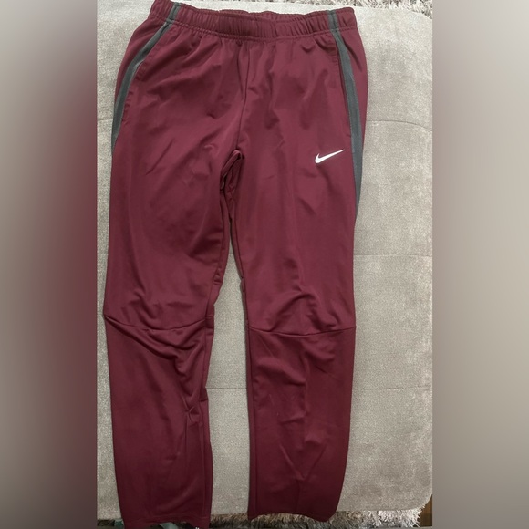 Nike joggers, maroon with grey stripe on side - Picture 3 of 3